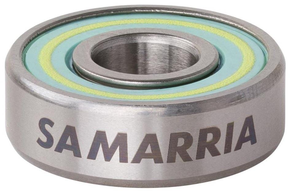 A metal skateboard ball bearing branded "SAMARRIA", similar in precision to Bronson Speed Co's offerings, features glowing inner rings in vibrant green and yellow, reminiscent of Samarria Brevard Pro G3 components.