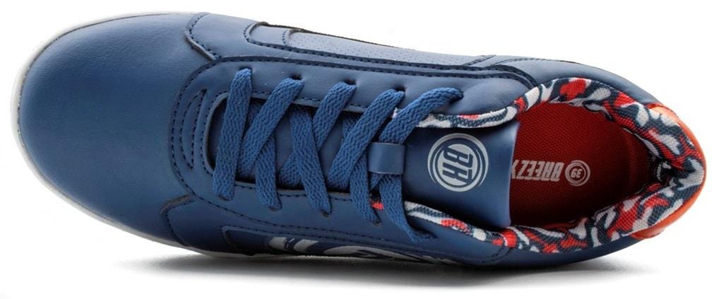 The Breezy Rollers Hero 2 Shoes - Blue by Breezy Rollers feature blue uppers and laces, a white logo on the tongue, a red, white, and blue inner lining, white branding on the insole, and a patented wheel system for smooth rolling. Viewed from above.