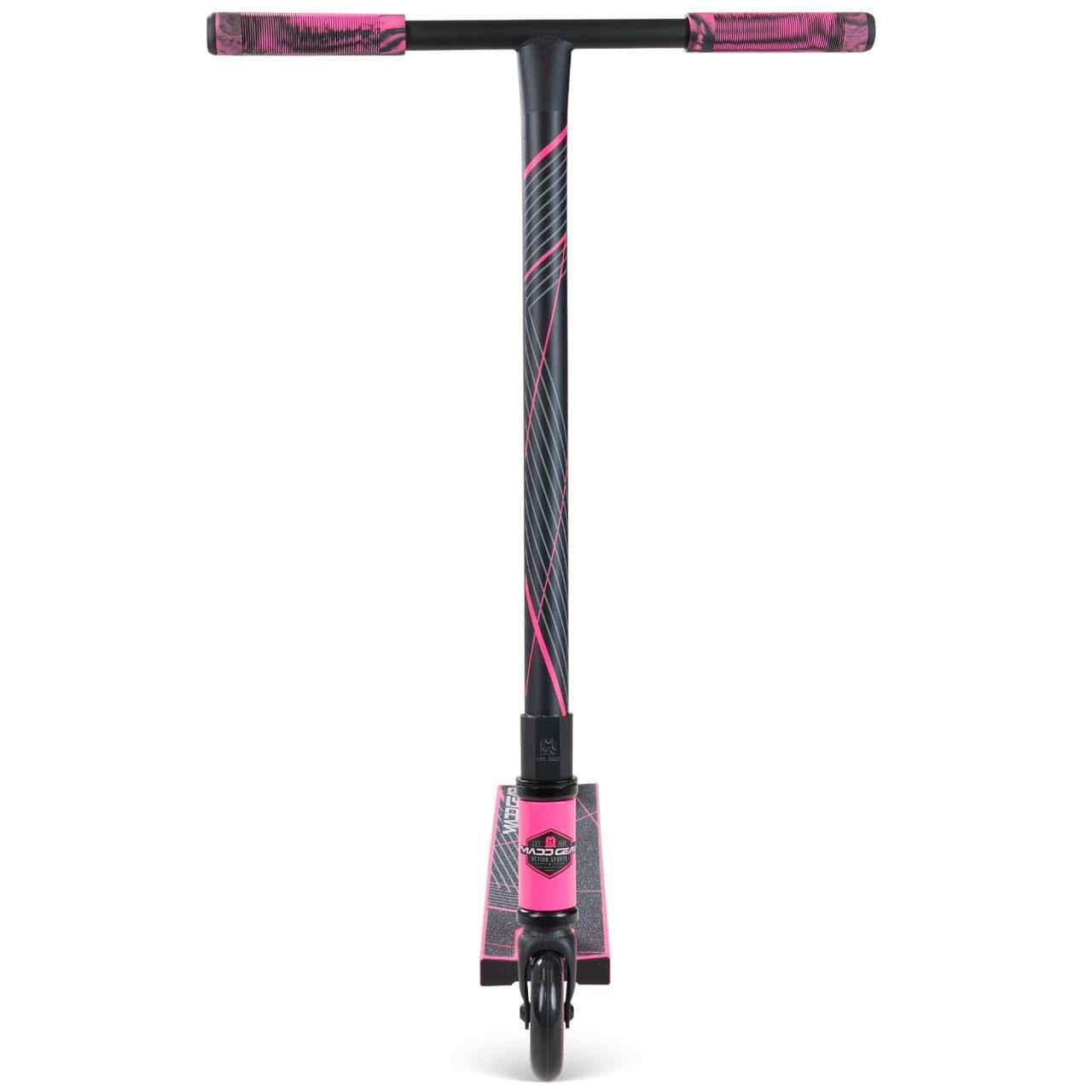 The Madd Gear MG 1 Raven Complete Stunt Scooter in Pink/Black features T-shaped handlebars with pink grips and a durable aluminium deck with a pink design above the front wheel. Brand: Madd Gear (MGP).
