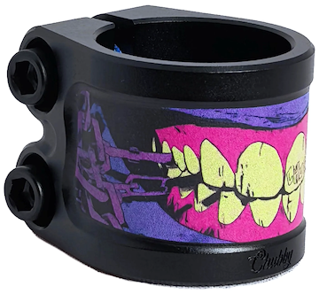 The Chubby Gnasher 2 Bolt Oversized Scooter Clamp by Chubby is made from tough 7075-T6 aluminium and showcases vibrant cartoon yellow teeth and pink gums on a purple-and-black design, with "Chubby" engraved in the lower right corner.