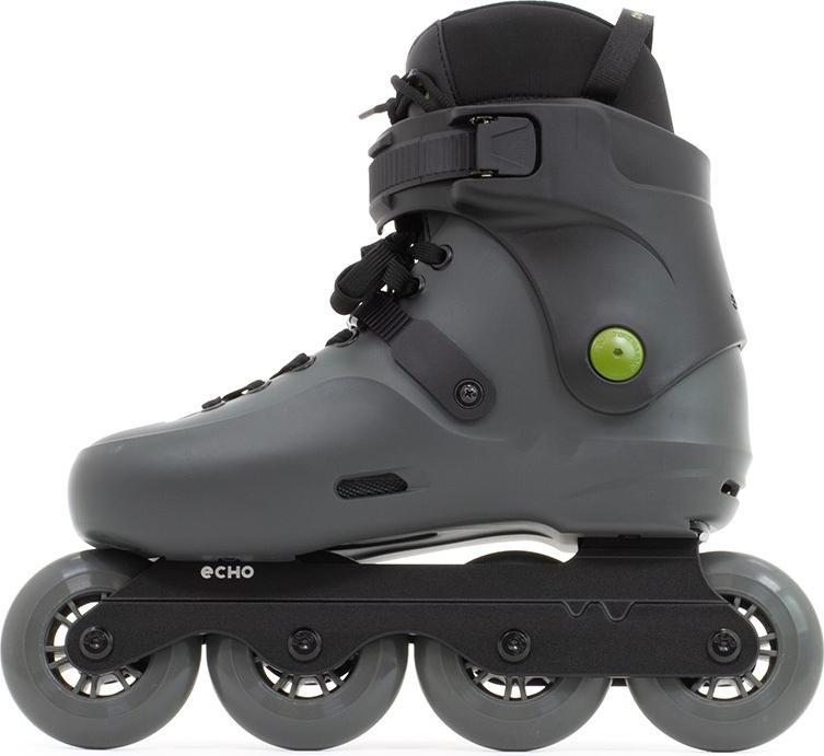 The Echo Sonar 4 Wheel Inline Freeskates - Black by Echo features a dark gray design with black laces, strap buckle, four wheels, and a green circular detail. "ECHO" is printed on the black frame—ideal for urban adventures.