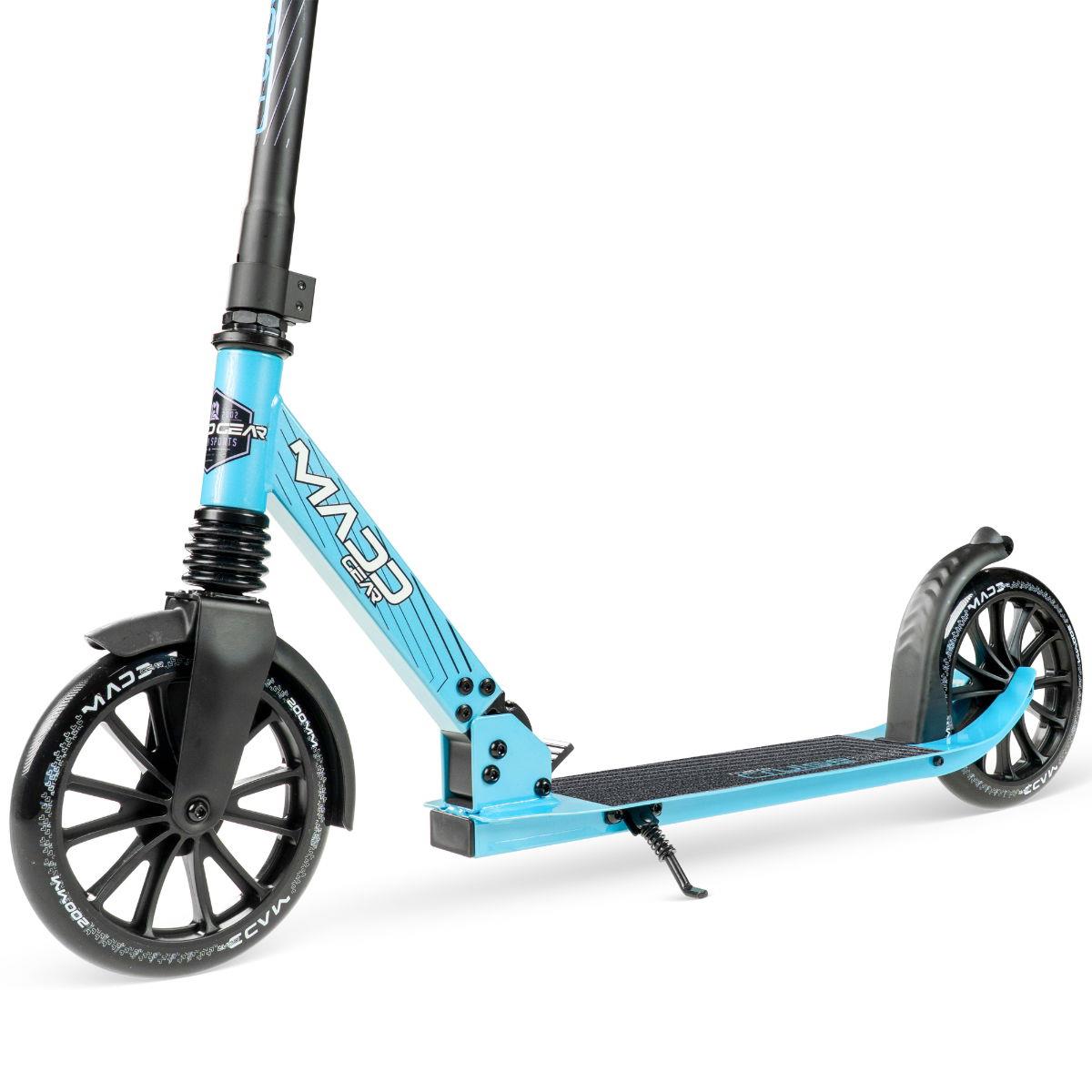 The Madd Gear Metro Cruise 250 Foldable Commuter Scooter in black/blue features large wheels, a sturdy deck, kickstand, adjustable handlebars for comfort, and the MGP logo on the frame—ideal for commuting.