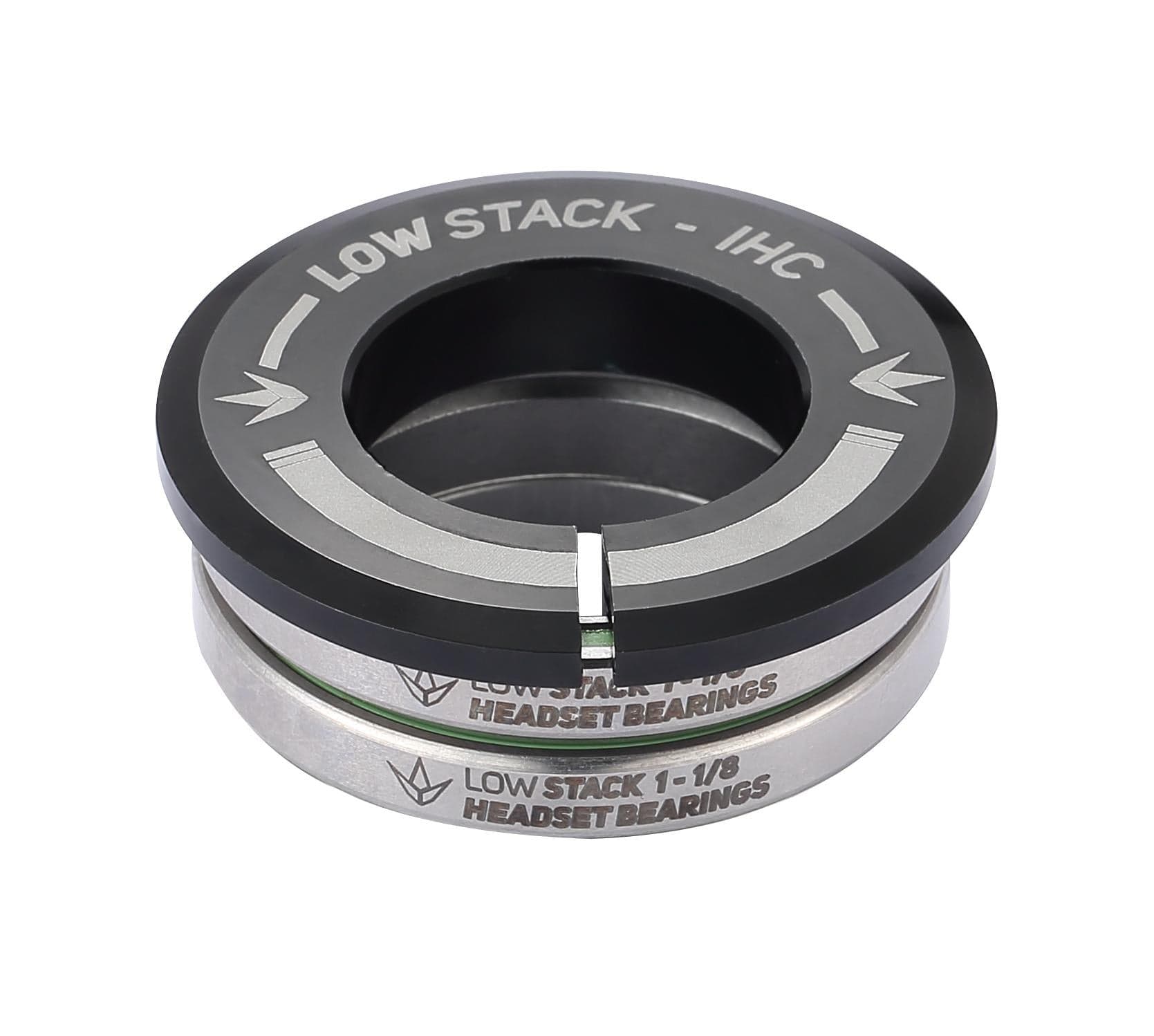 The Blunt Envy Low Stack IHC Integrated Stunt Scooter Headset in black and silver is perfect for Blunt Envy Stunt Scooters. The top section features engraved text on a sleek black surface, while the bottom shines in metallic silver and includes sealed bearings for a smooth ride.