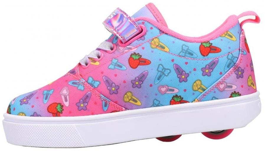 The Heelys Pro 20 X2 Girls Shoes by Heelys feature a pink and cyan gradient nylon upper with strawberry, flower, ring, and bow details, a shiny pink strap, white sole, and two heel wheels with ABEC 5 bearings.