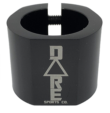 The Dare Warlord 2 Bolt Standard Stunt Scooter Clamp in black, crafted by Dare, is a CNC machined, lightweight metal clamp featuring a hexagonal shape with an engraved "Dare" name and a slit for tightening. It offers exceptional grip and durability, making it perfect for extreme sports enthusiasts.