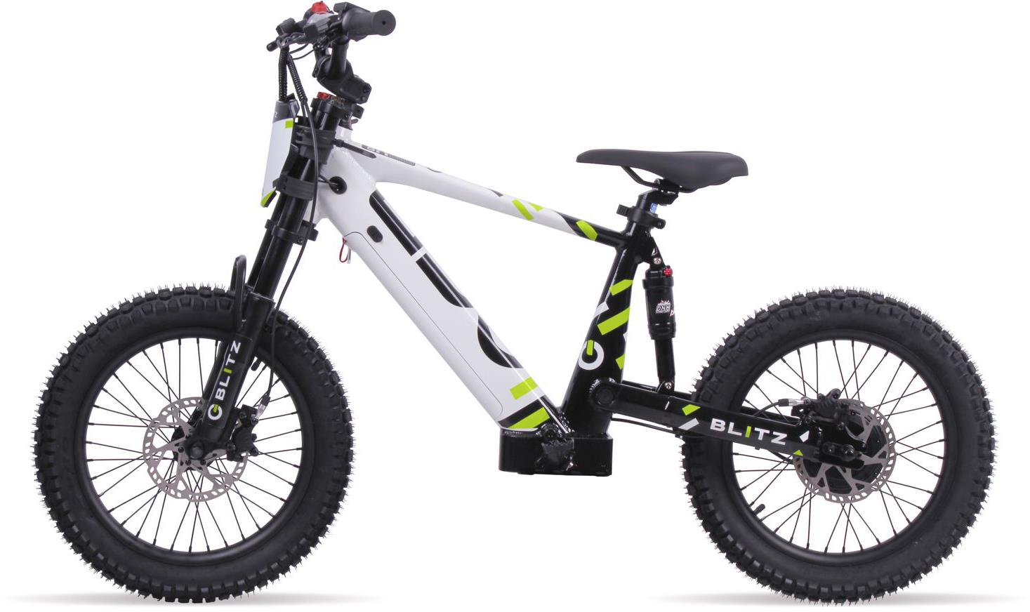 The Duo 18" Blitz Kids Electric Balance Bike in white and black features thick knobby tires, front and rear suspension, disc brakes, and green accents. Shown side profile on a white background. Brand: Duo.
