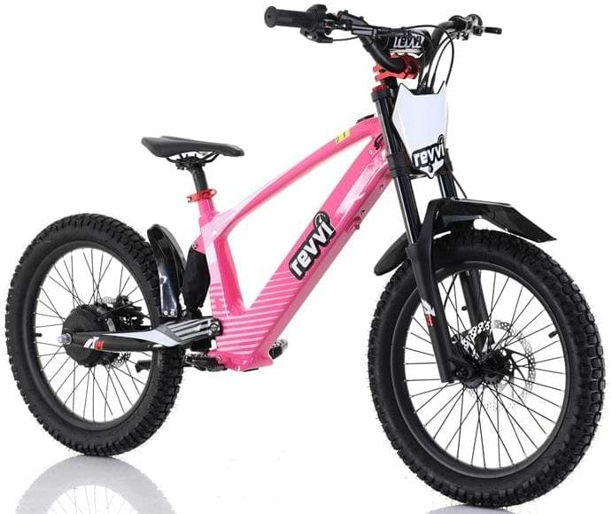 The Revvi 20" Kids Electric Balance Bike - Pink has a black seat, handlebars, tires, and kickstand. It features a front suspension fork and adjustable speed settings for its electric motor. The "Revvi" brand is displayed on its sturdy frame.