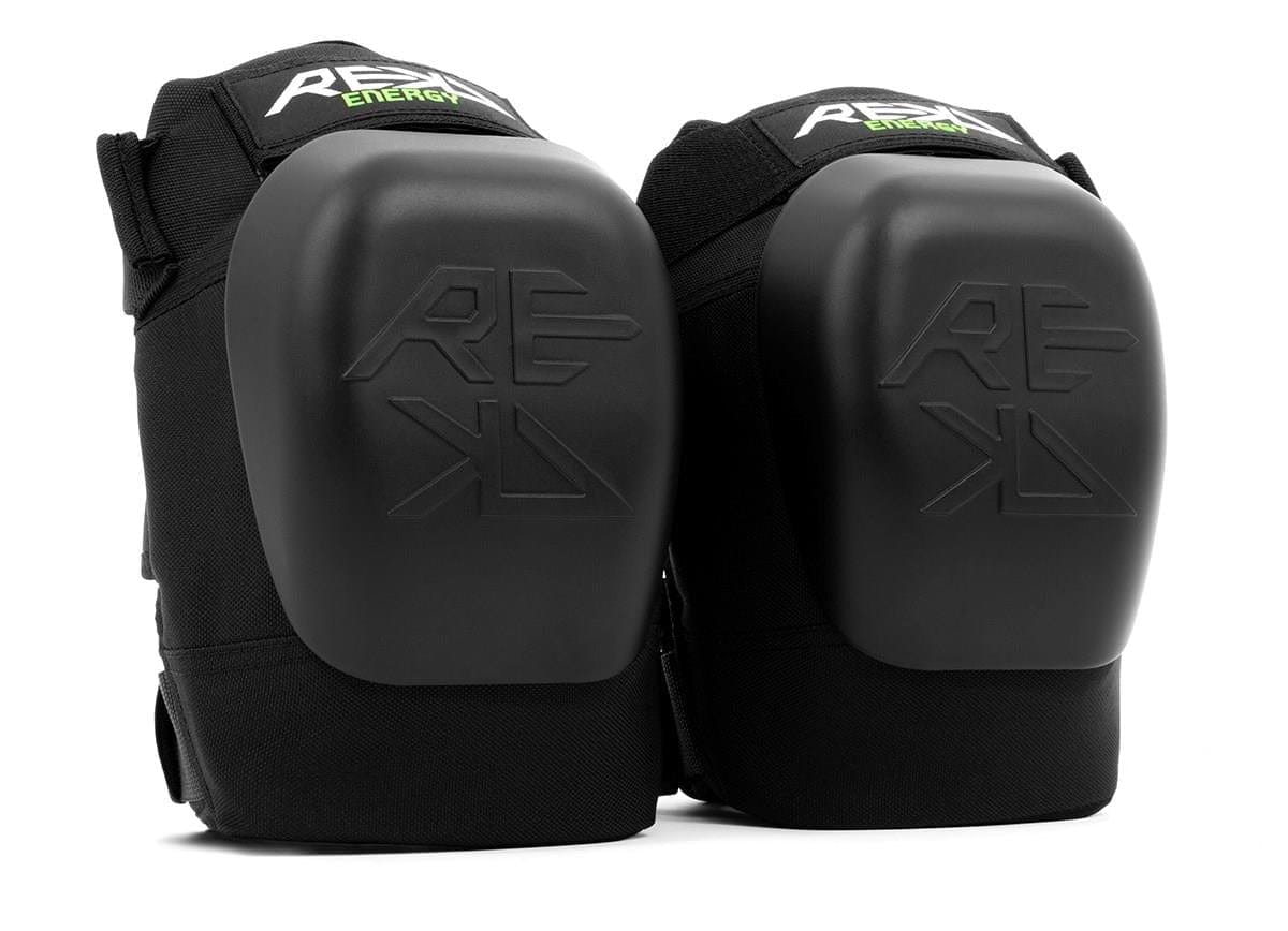 The REKD Energy Patrol Ramp Knee Skate Protection Pads in black are ideal for extreme sports. Featuring the REKD logo and hard plastic impact caps, these pads offer reliable knee protection with adjustable straps, perfect for activities like skating or biking.