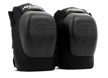 The REKD Energy Patrol Ramp Knee Skate Protection Pads in black are ideal for extreme sports. Featuring the REKD logo and hard plastic impact caps, these pads offer reliable knee protection with adjustable straps, perfect for activities like skating or biking.