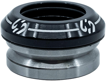 A close-up of the CORE Icon Integrated Stunt Scooter Headset in black, featuring durable bearings and white markings on the top cap, designed by CORE for smooth rotation in stunt scooter steering tube assemblies.