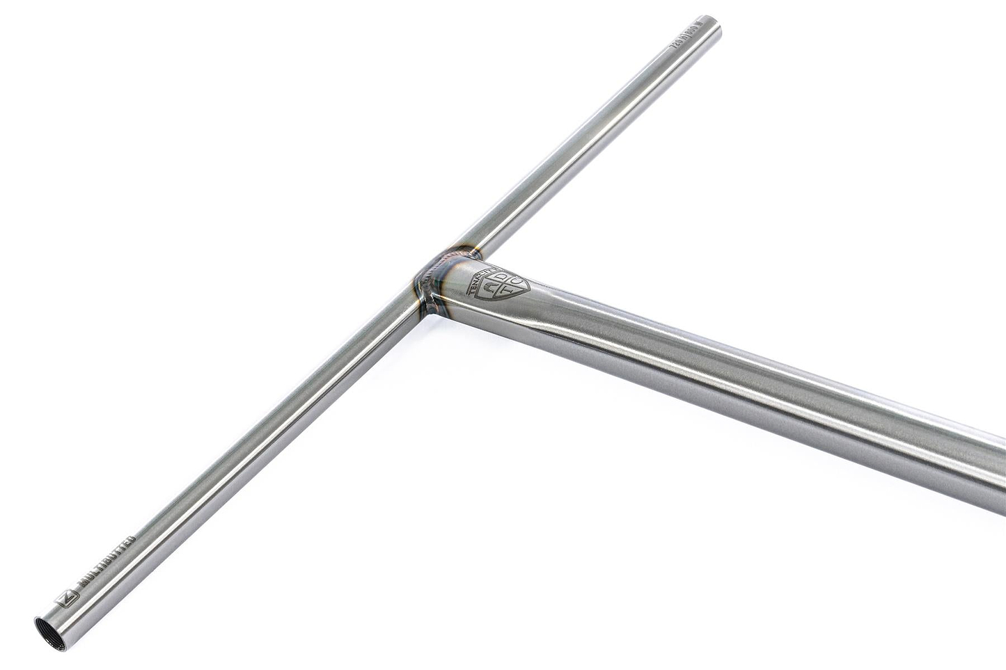 The Ethic DTC Tenacity V2 Steel Oversized HIC Stunt Scooter T-Bars feature a raw metal T-shape, reinforced welded center joint, small logo at the junction, and measure 620mm x 600mm.