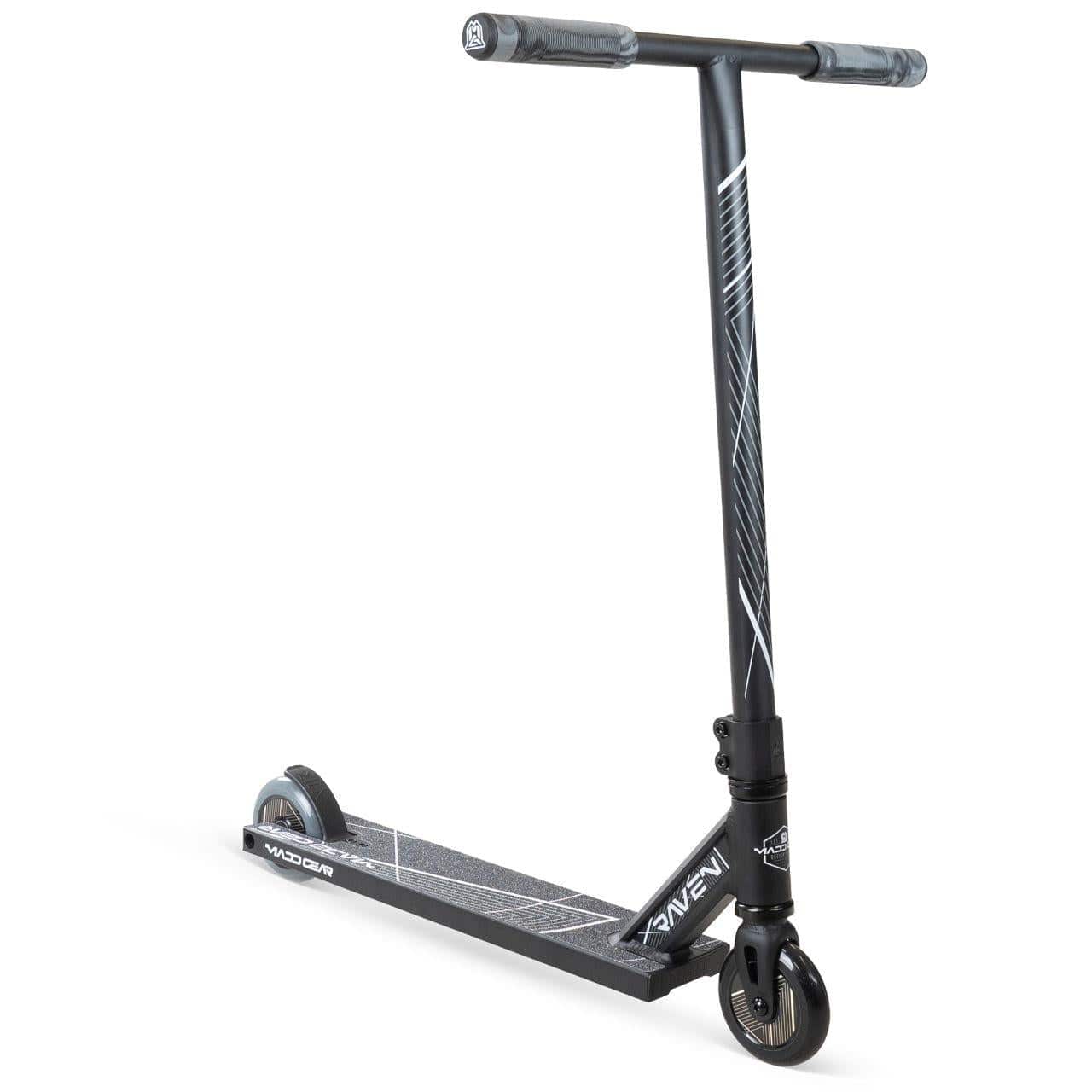 A black Madd Gear MG 1 Raven Complete Stunt Scooter with a wide deck, two small wheels, and a tall T-shaped handlebar. Features stylish design, brand name "Madd Gear (MGP)" on the deck and stem, and is built for lightweight performance.