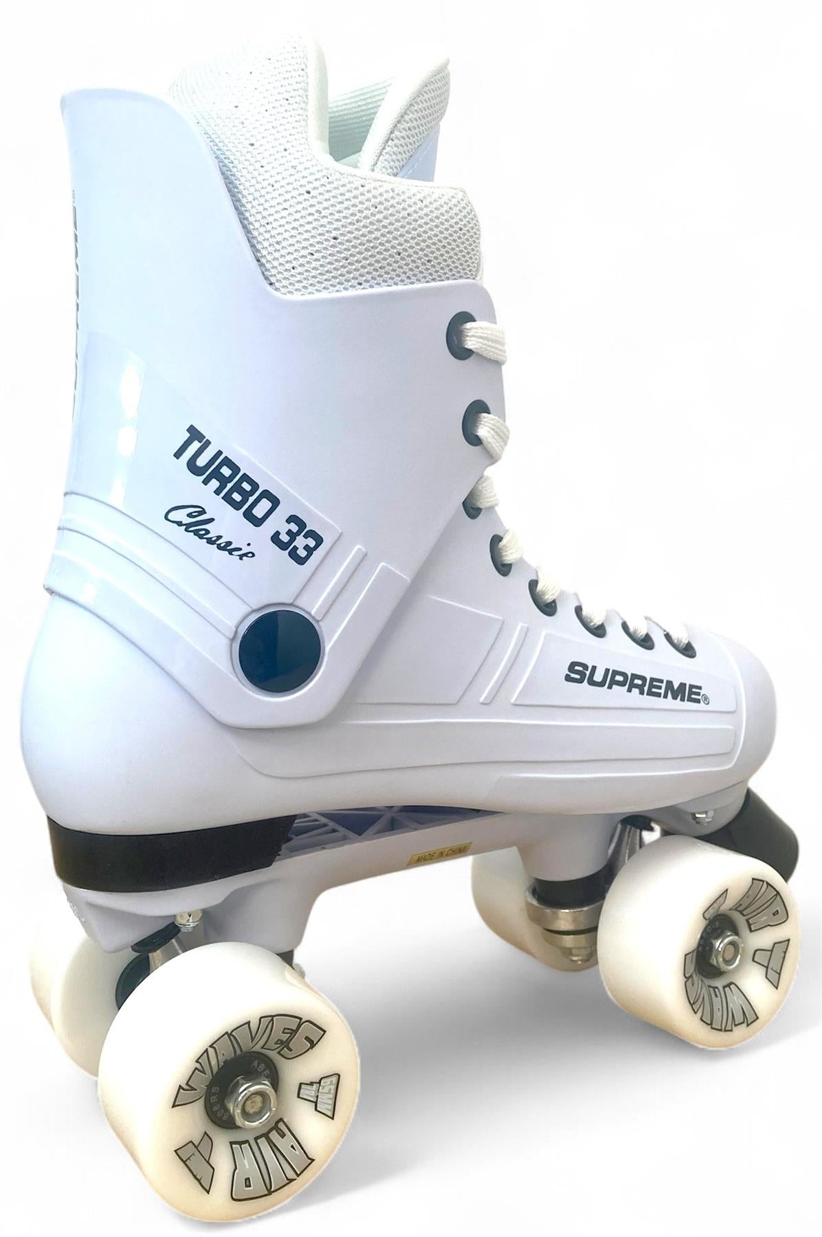 The Supreme Turbo 33 Nylon Quad Roller Skates in white with white wheels feature high ankle support and white laces, displayed against a plain background.