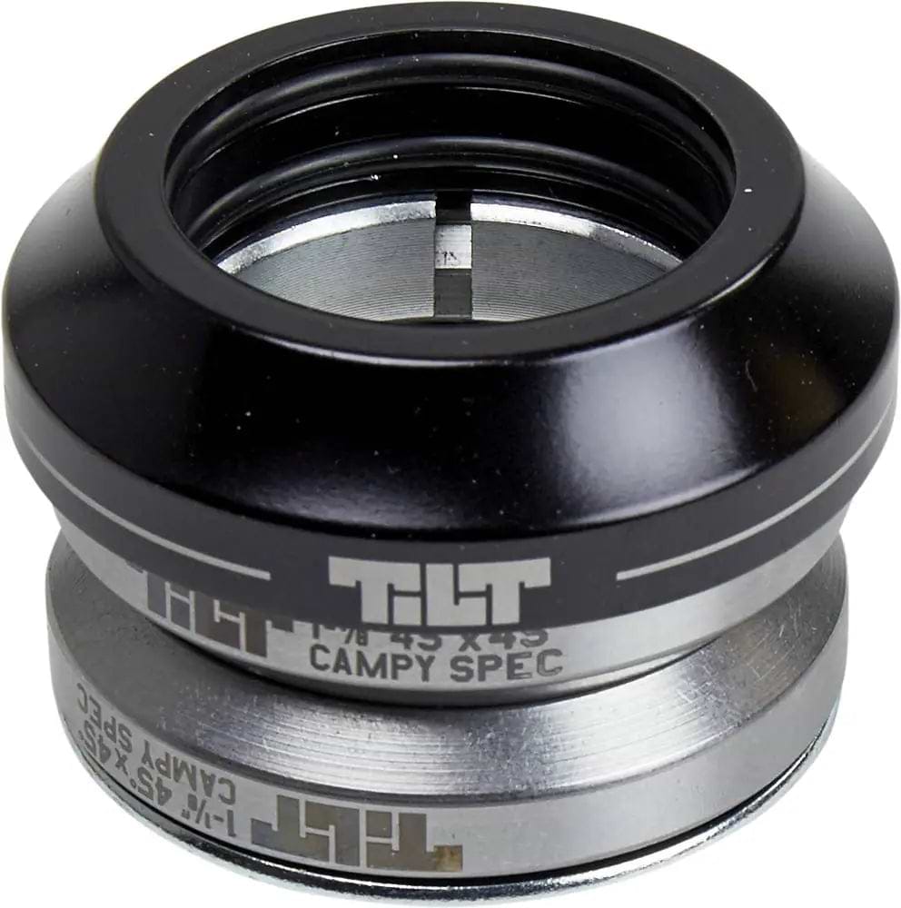 A close-up of the Tilt Tall Stack Integrated Stunt Scooter Headset in black by Tilt, featuring precision-sealed campy spec bearings and an integrated spacer for smooth scooter steering.