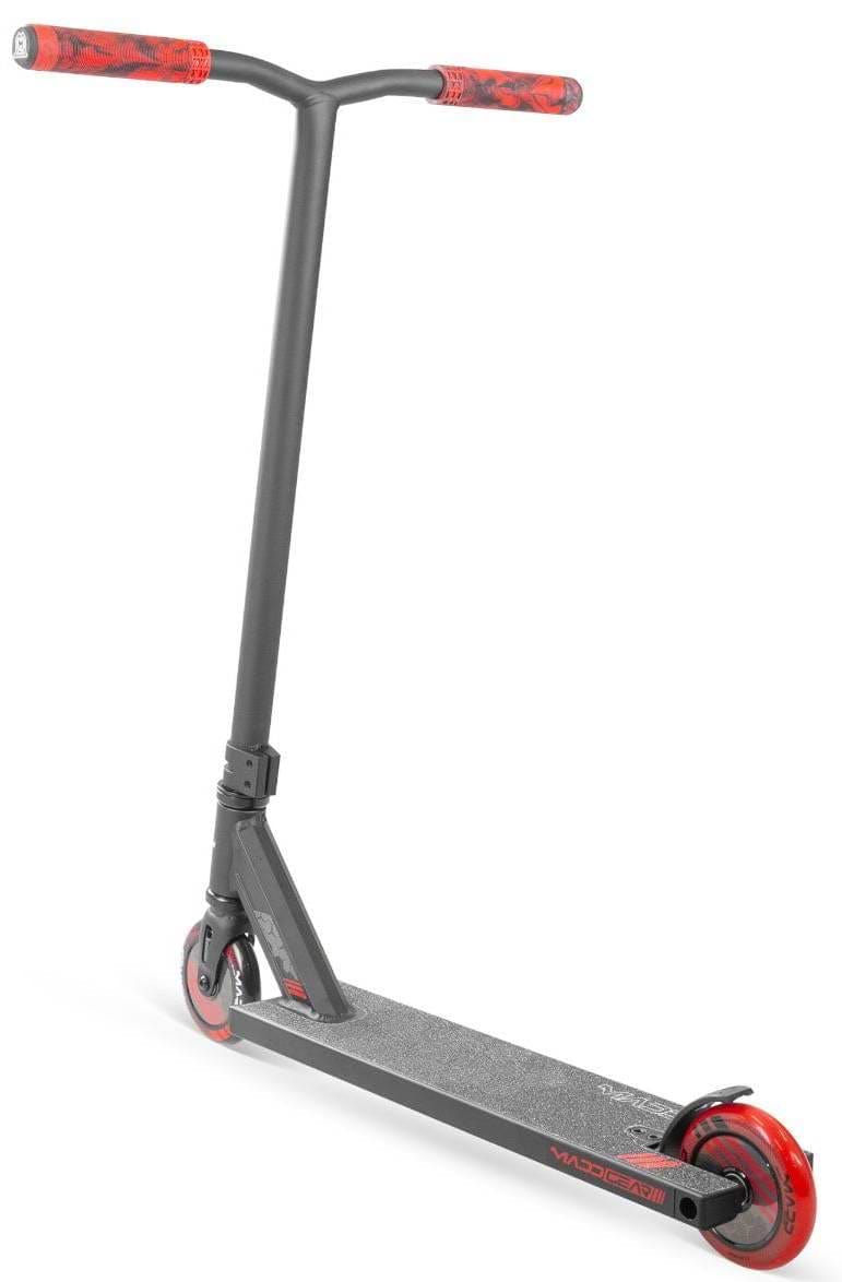The Madd Gear MG 3 Zen Complete Stunt Scooter - Black / Red by MGP is shown from a left front angle on a white background, highlighting its red handle grips and wheels—ideal for kids starting with their first pro stunt scooter.