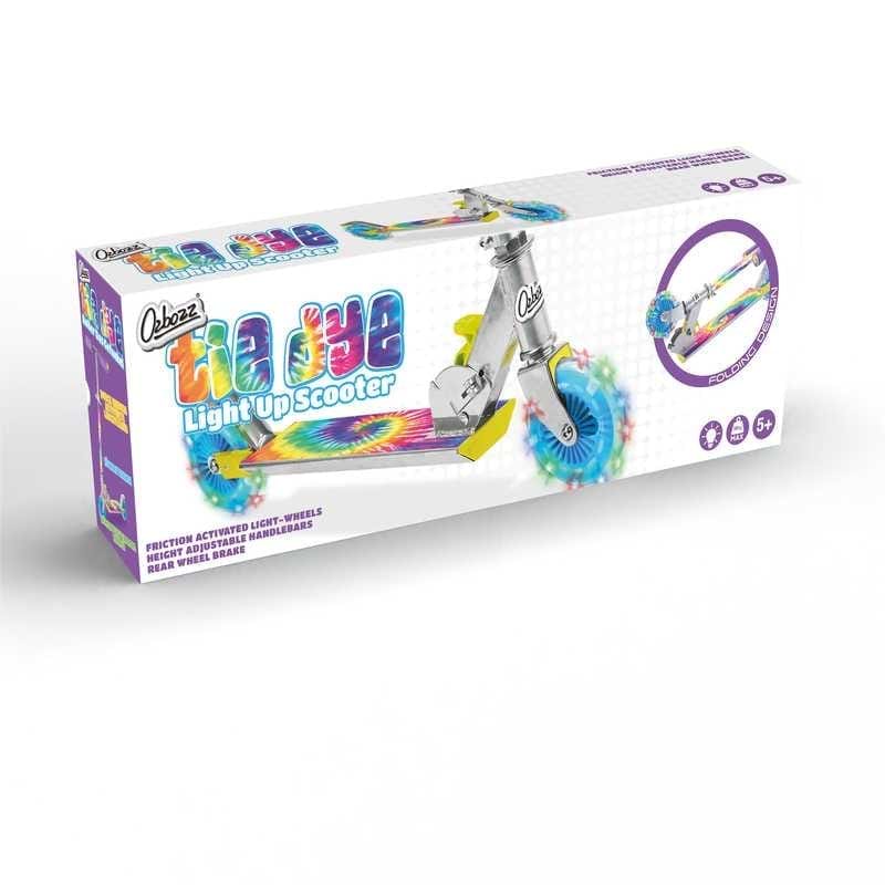 The Ozbozz Tie Dye Light Up Foldable Kids Kick Scooter box displays a vibrant multi-color design, featuring tie-dye LED patterns. The packaging highlights friction-activated light-up wheels and adjustable handlebars, perfect for children aged 5 and up.