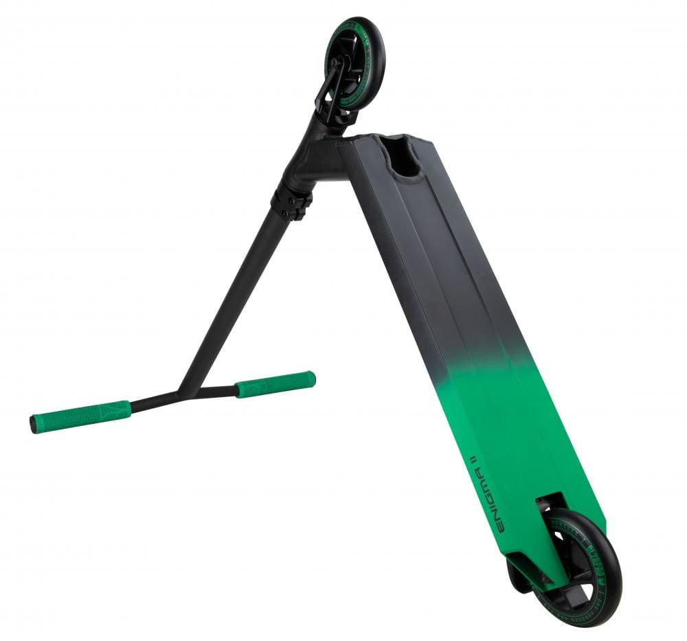 The Blazer Pro Enigma 2 Complete Stunt Scooter in Black and Green showcases a sleek design with a black frame accented by green-trimmed wheels. It features beginner-friendly, sturdy Chromoly Steel Wing bars, complemented by green handles. The scooter is set against a white background.