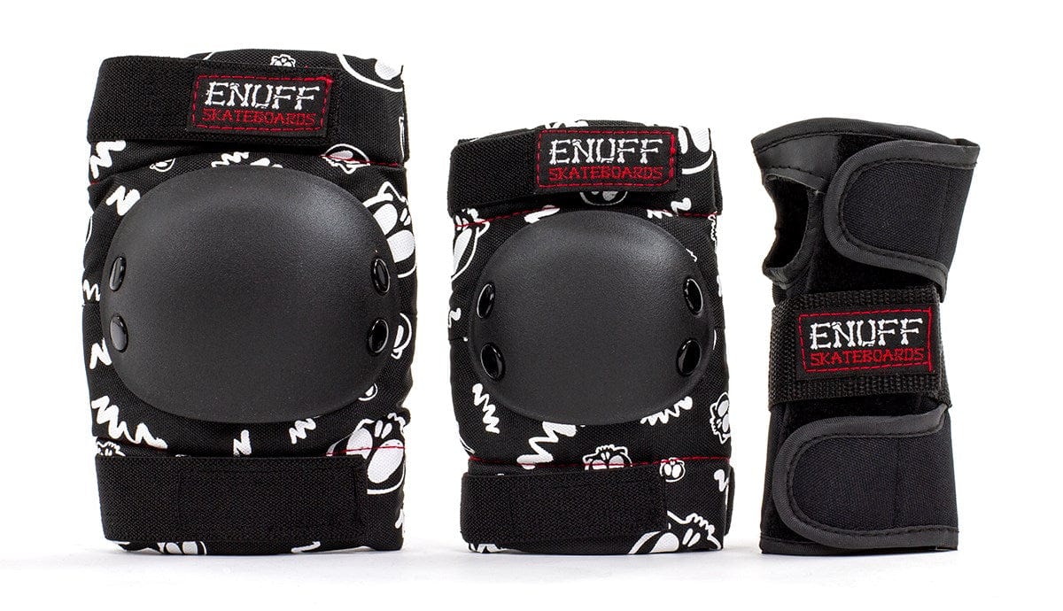 Explore the Enuff Skulls Junior Ramp Skate Protection Pad Set in black, designed with comfort padding for skateboarders. This set includes knee and elbow pads, along with wrist guards, all featuring striking white graphic designs. Each piece is adorned with a red and black "Enuff Skateboards" patch for extra style.