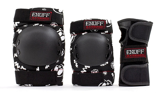 Explore the Enuff Skulls Junior Ramp Skate Protection Pad Set in black, designed with comfort padding for skateboarders. This set includes knee and elbow pads, along with wrist guards, all featuring striking white graphic designs. Each piece is adorned with a red and black "Enuff Skateboards" patch for extra style.