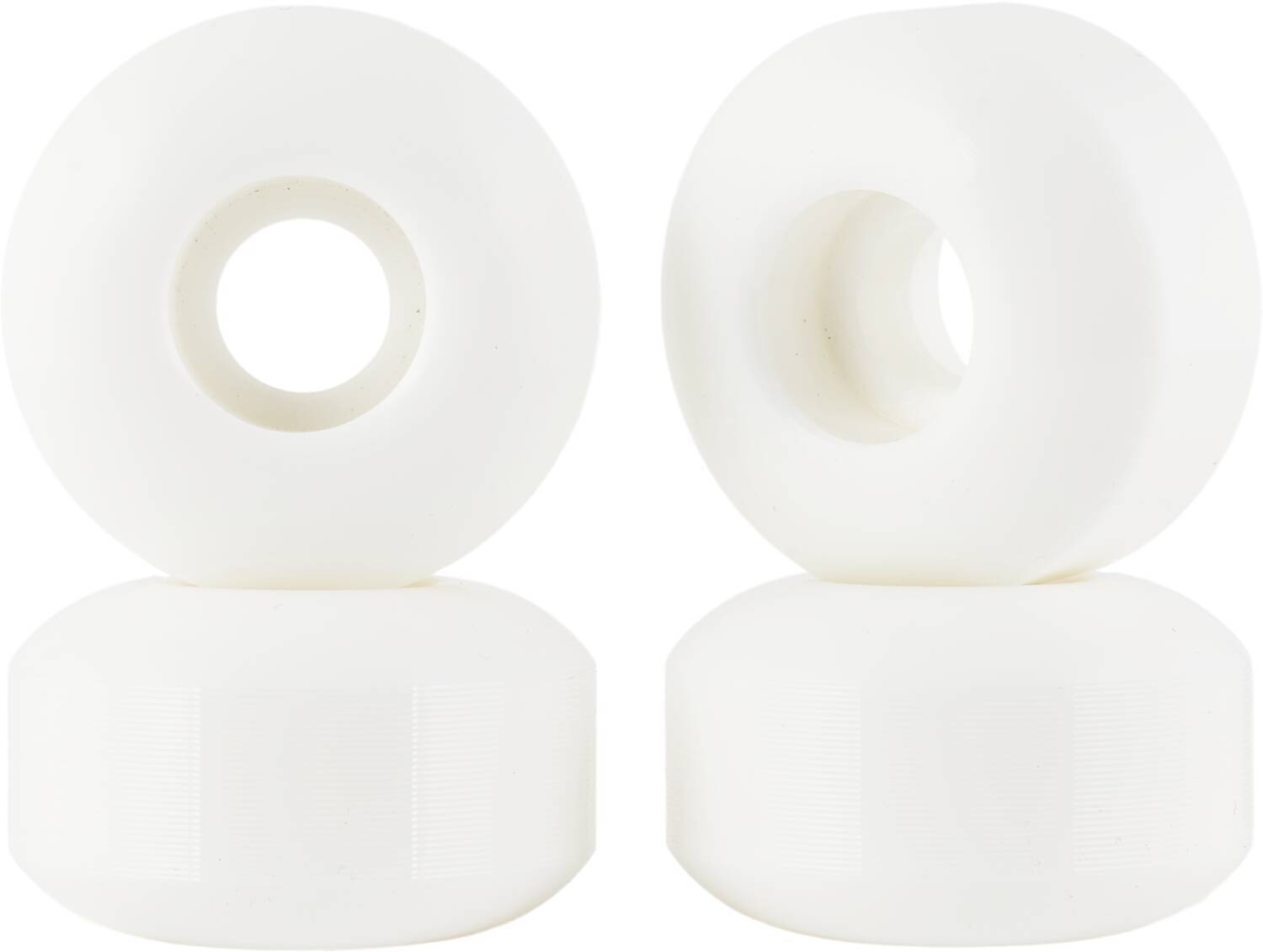 A set of four white Essentials Skinny 54mm 95A Skateboard Wheels are neatly stacked in two pairs. Each wheel is distinguished by its smooth surface and central circular opening, renowned for exceptional handling. Set against a plain white backdrop, the quality design of these Essentials wheels stands out prominently.