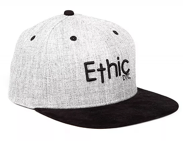 The Ethic DTC Snapback Cap - Deerstalker Grey showcases a timeless snapback style, featuring a gray crown paired with a black brim. The front prominently displays the word "Ethic" embroidered in black, while the smaller letters "DTC" are artistically positioned below, emphasizing its distinctive embroidered Ethic logo.