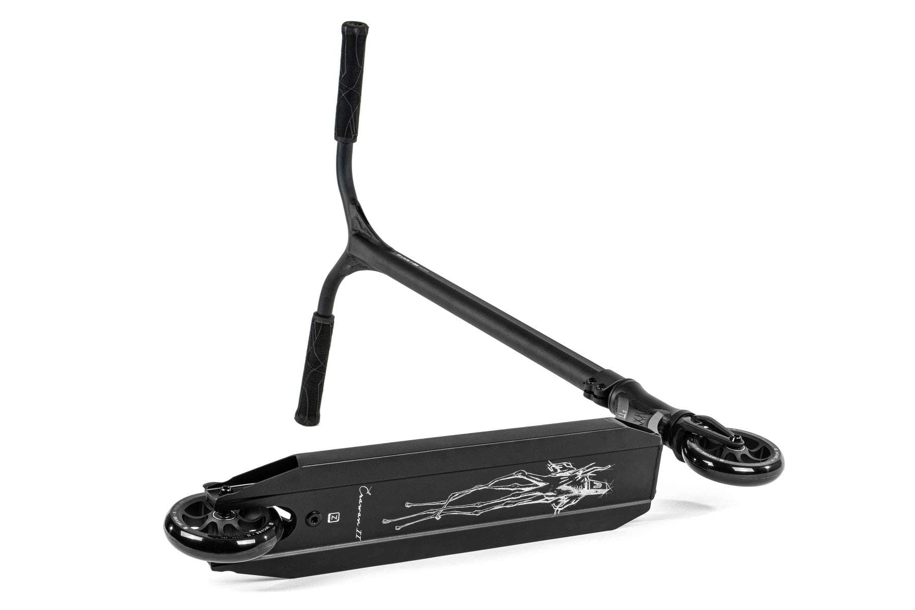 The Ethic DTC Erawan V2 Complete Stunt Scooter (S) - Black, one of the lightest scooters available, is partially folded to display its sleek design and minimalist graphics on the deck. The handlebar is detached and positioned next to the scooter, illustrating the assembly process typical of a Complete Stunt Scooter from Ethic.