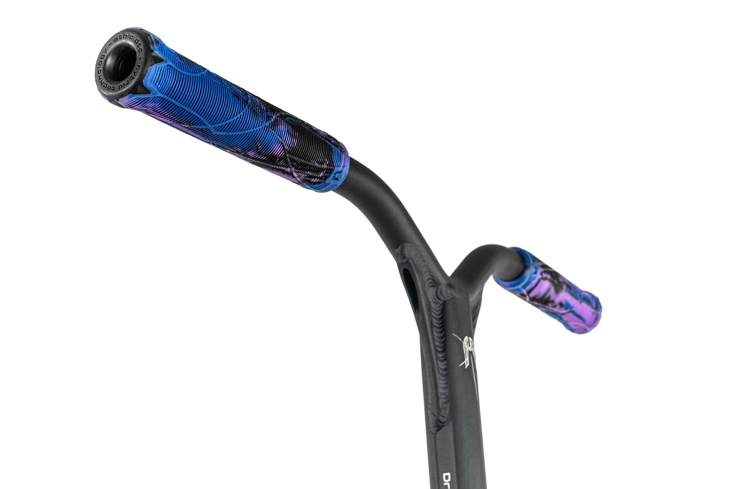 Close-up of scooter handlebars showcasing blue and black grips with a tie-dye pattern. Reminiscent of the vibrant Ethic DTC Erawan V2 Complete Stunt Scooter in Blue Iridium, the matte black frame offers a sleek contrast while the textured grip enhances control. The minimalist white background highlights its stylish design.