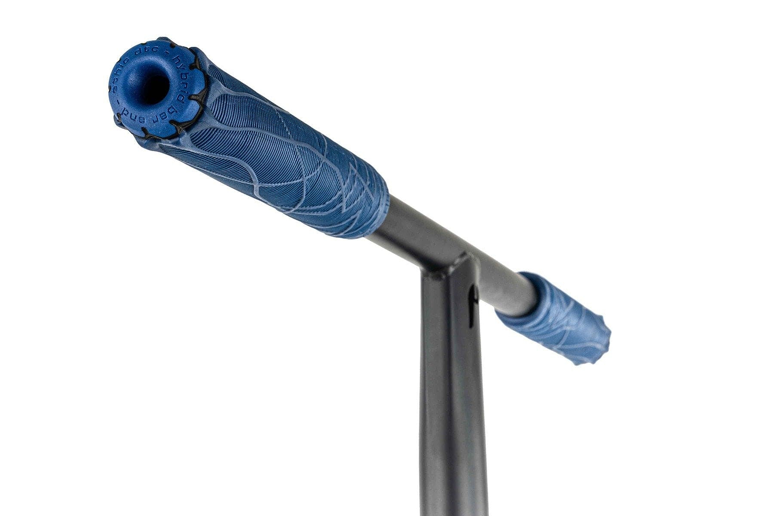 Close-up of the Ethic DTC Pandora Complete Stunt Scooter (M) - Blue's handlebar, highlighting its blue grips with a textured design. This street-oriented Ethic scooter boasts a sleek metallic finish and features a robust chromoly steel T-bar for enhanced durability.