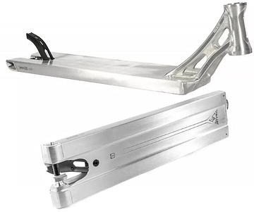 Two silver stunt scooter decks are displayed. The top deck is an Ethic DTC Vulcain V2 Boxed 12 STD Raw Silver Stunt Scooter Deck, showcasing a cutout for a brake attachment. The bottom one reveals its underside and headtube, featuring a sleek metallic finish and geometric cutouts for a lightweight design with the 12 STD bearing system.