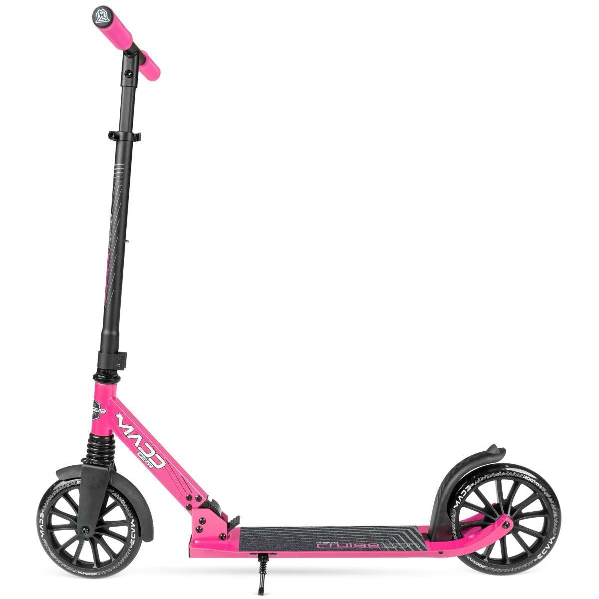 The Madd Gear Metro Cruise 250 Foldable Commuter Scooter by MGP features a black deck, pink handlebars, large wheels, an adjustable handlebar, and a kickstand. Shown in black and pink colors on a white background.