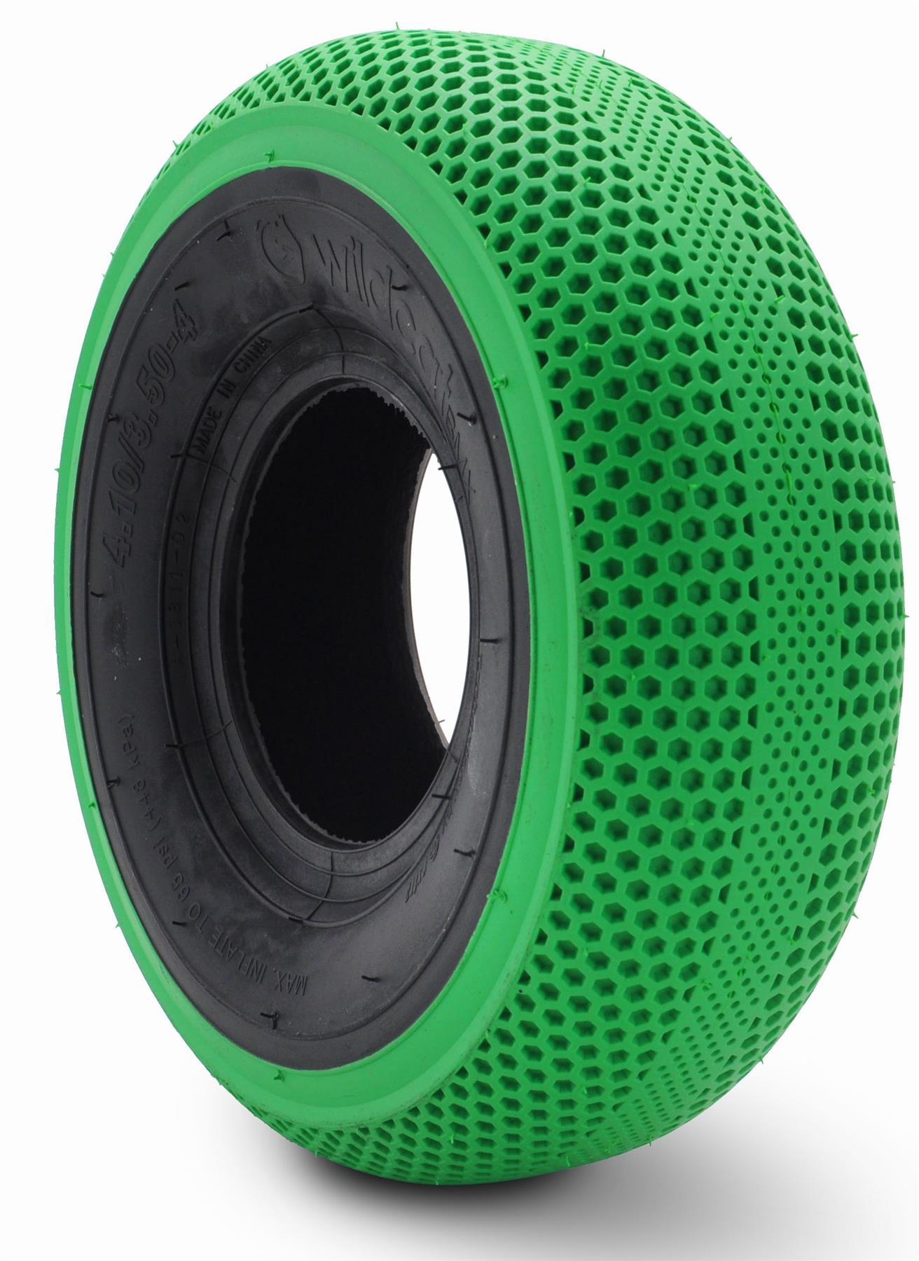 A close-up of a green, honeycomb-patterned solid tire with a black inner hub, designed for the Wildcat OG Pro Mini BMX Bike - Joker Green Hulk by Wildcat. The surface has hexagonal holes and a Turbo wheel design for durability and cushioning.