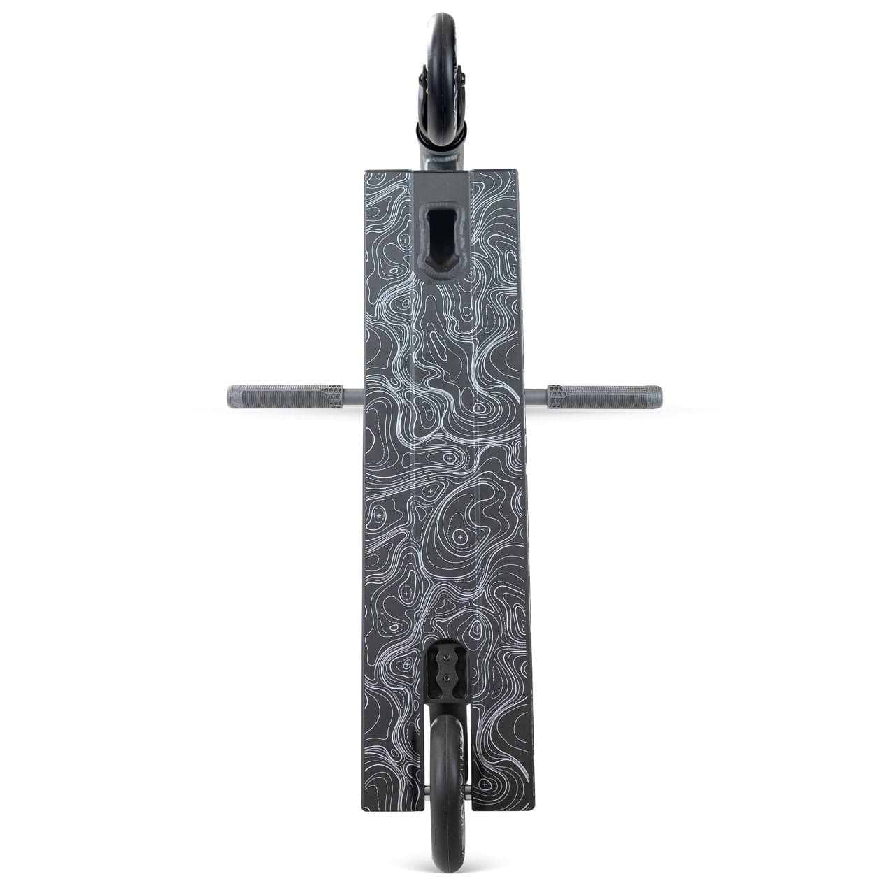 Top-down view of the Madd Gear MG 4 Titan Complete Stunt Scooter in black by Madd Gear (MGP), featuring a rectangular deck with a black and white contour pattern, two black wheels, and horizontal handlebars—ideal for perfecting freestyle tricks.