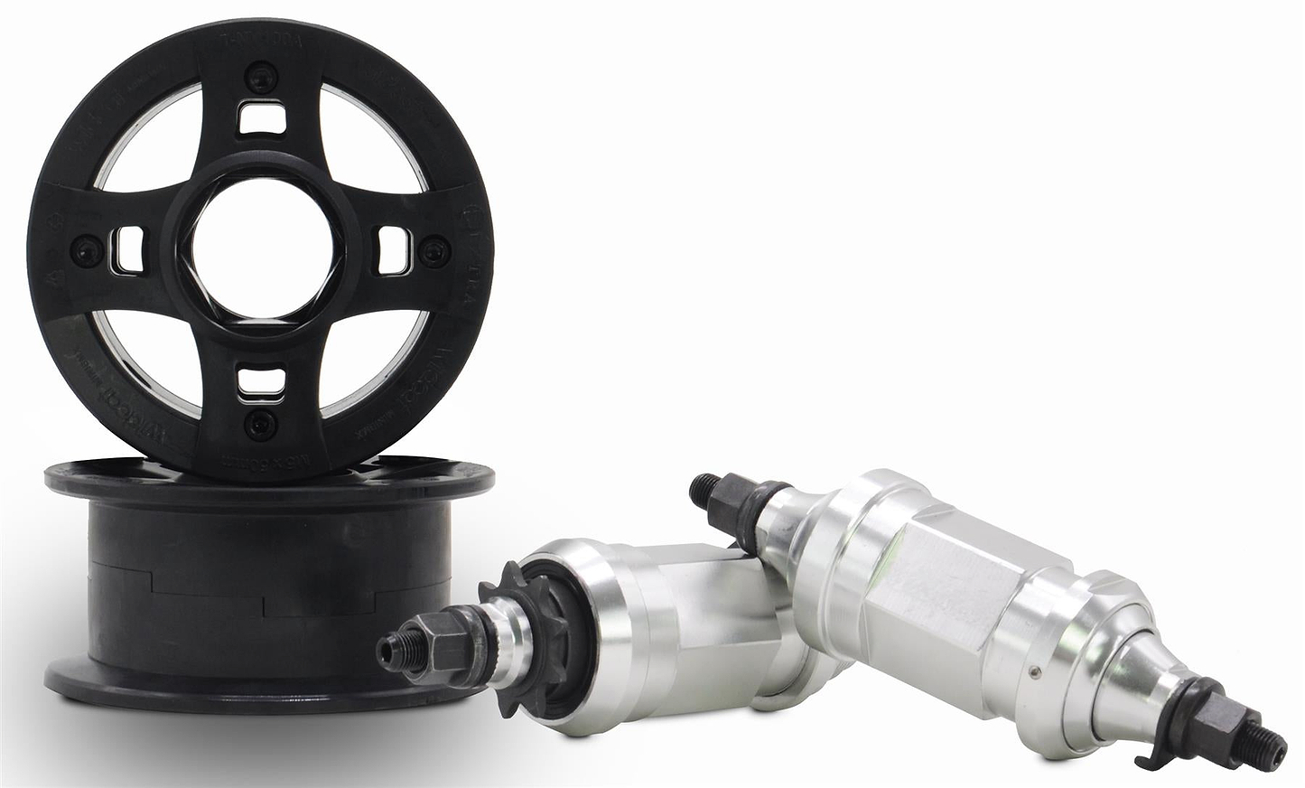 Two black plastic spools and two silver metal parts with threaded black ends are shown on a white background, appearing as components compatible with the Wildcat OG 3A Mini BMX Bike - Galaxy Purple by Wildcat.