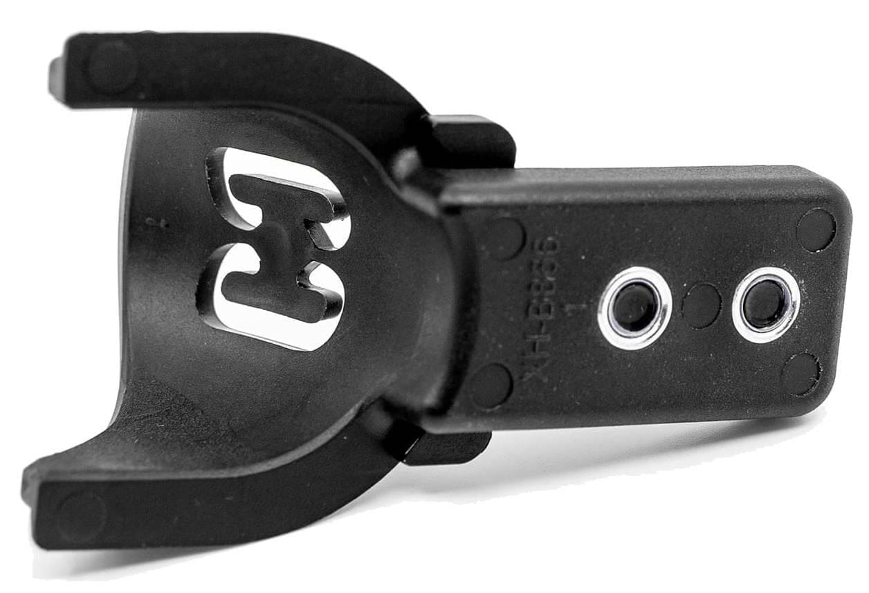 The CORE ST Nylon Stunt Scooter Fender in black features vent holes and an embossed design, shown at an angle revealing the front and side—ideal for riders of CORE stunt scooters.