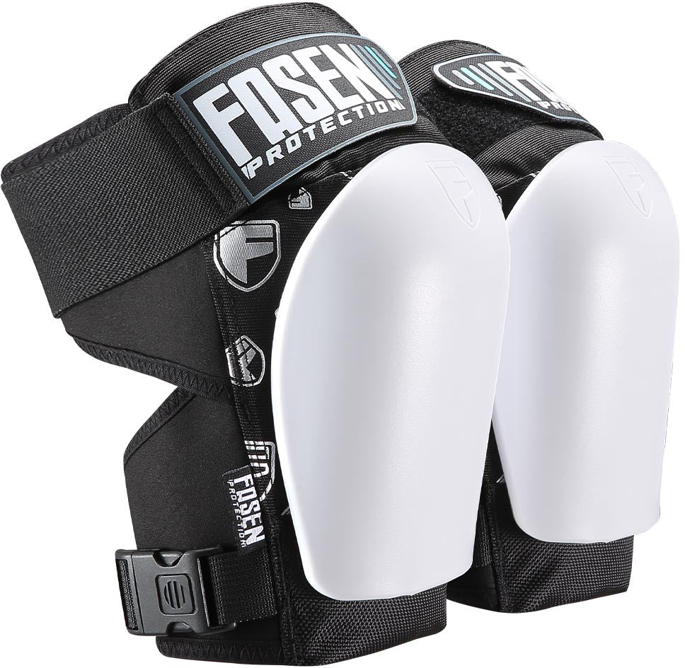 A pair of Fasen Sliders Pro Knee Skate Protection Pads in white, featuring black and white low-profile hard shells with adjustable straps and buckles—ideal scooter protective gear from Fasen for dependable comfort and security.