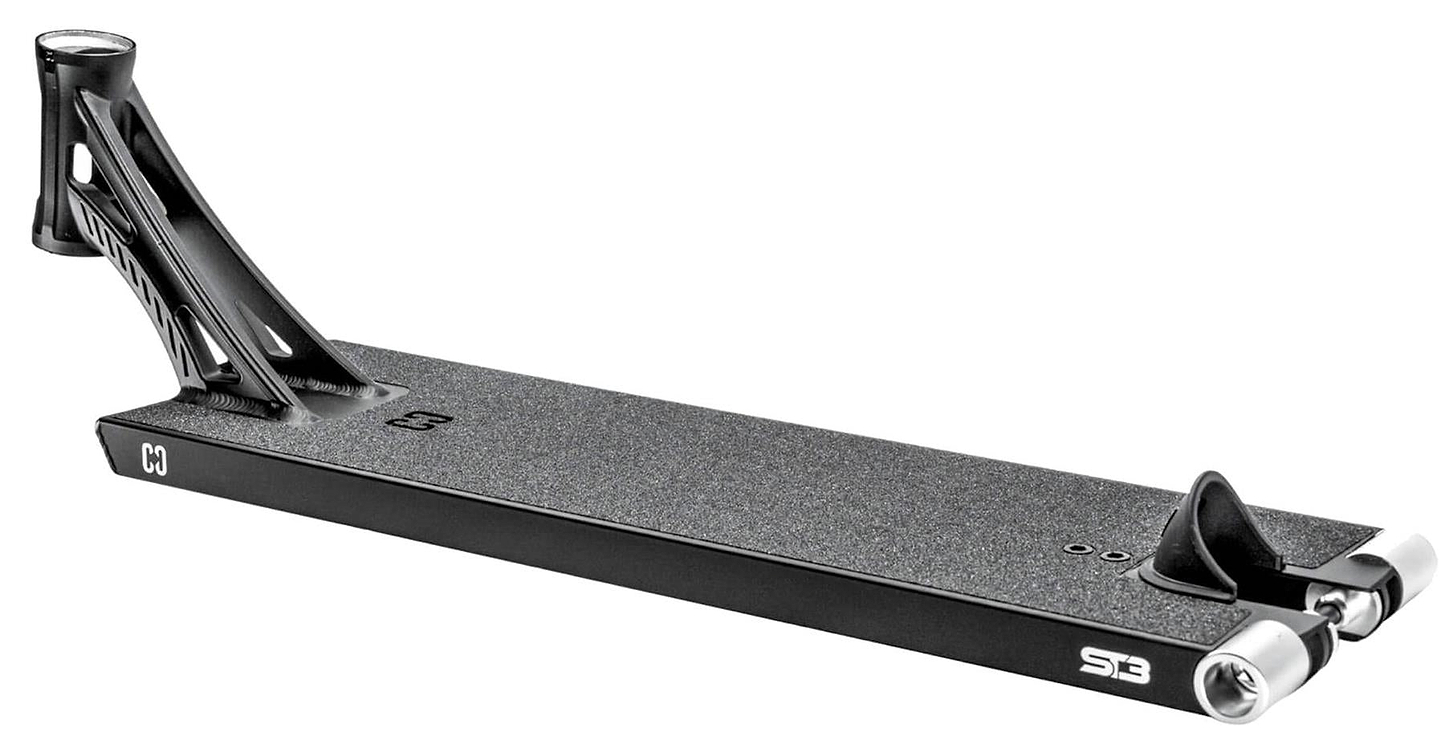 The CORE ST3 Forged Black Street Stunt Scooter Deck (6.5" x 22.5") features a textured surface, open triangular neck, brake, two rear wheels, and white "CO" and "S3" CORE markings; part of the CORE ST3 series.