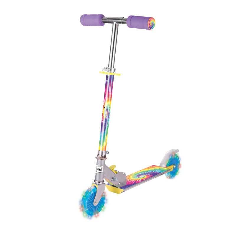 The Ozbozz Tie Dye Light Up Foldable Kids Kick Scooter features a vibrant tie-dye design with rainbow-style LED light-up wheels, purple handle grips, and blue wheels, perfect for brightening any ride.