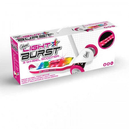 The packaging of the Ozbozz Light Burst Light Up Kids Tri-Scooter - Pink / White features a primarily white box adorned with vibrant graphics. It showcases the scooter's pink wheels and light-up deck, emphasizing the illuminating appeal of this three-wheeled scooter, making it an eye-catching choice for young adventurers.