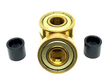 The Logic ABEC 11 Gold Scooter Bearings - 4 Pack features two gold-colored ball bearings stacked vertically and flanked by two black cylindrical components. This premium-quality set from Logic ensures top performance speed in a balanced and symmetrical arrangement against a plain white background.