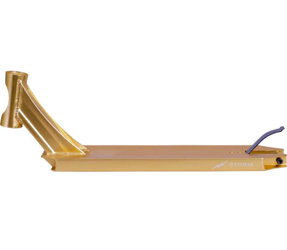 The Revolution Storm Gold Chrome Stunt Scooter Deck is a park rider's dream, featuring a sleek design with an integrated headtube and concave structure. The "Revolution Storm Gold Chrome Stunt Scooter Deck - 4.7\" x 19\"" label graces its body, and the brake is perfectly positioned at the back, elegantly showcased from a side angle.