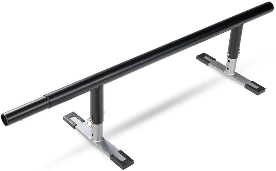 A black metal Madd Gear skate rail with adjustable height and sturdy silver-and-black base legs for skate or inline tricks. Compatible with the Madd Gear MGP Grind Rail Extension Kit - 91cm for added length and challenge.