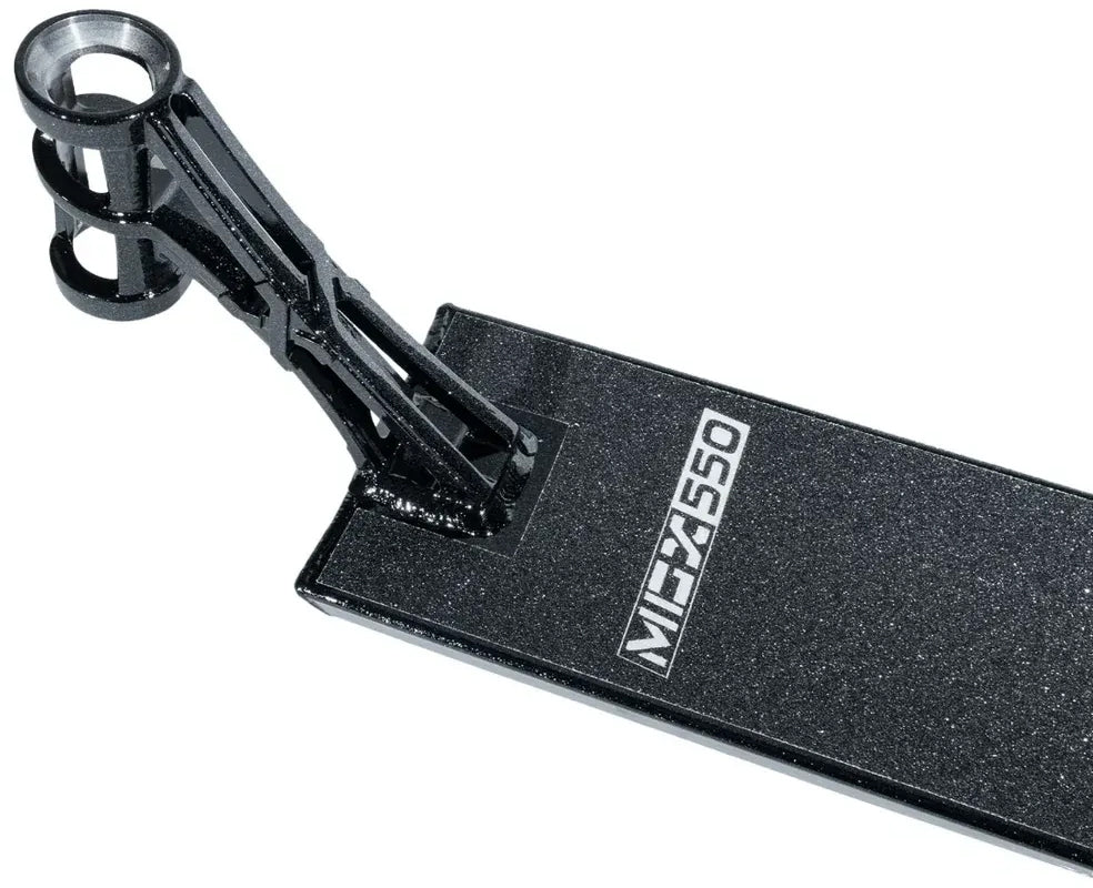 A close-up of the Madd Gear MGP MGX Black Stunt Scooter Deck (5.5″ x 20.5″) shows the headtube and part of the neck assembly, making it an ideal choice for riders looking to upgrade their park and street scooter with a stylish, MGX-inspired design from Madd Gear.