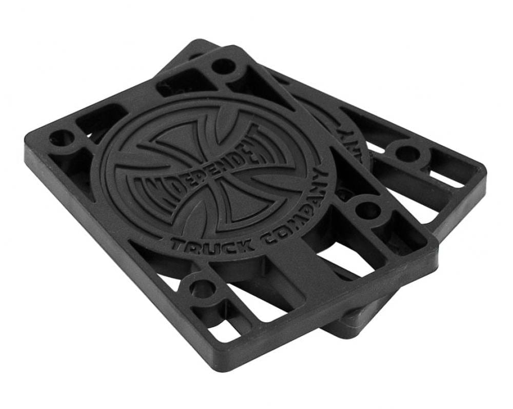 A pair of black 1/4" Independent Skateboard Riser Pads, embossed with the "Independent" logo at the center, showcases a circular design and corner holes for durability. Perfect for Indy Trucks enthusiasts who value both reliability and style.