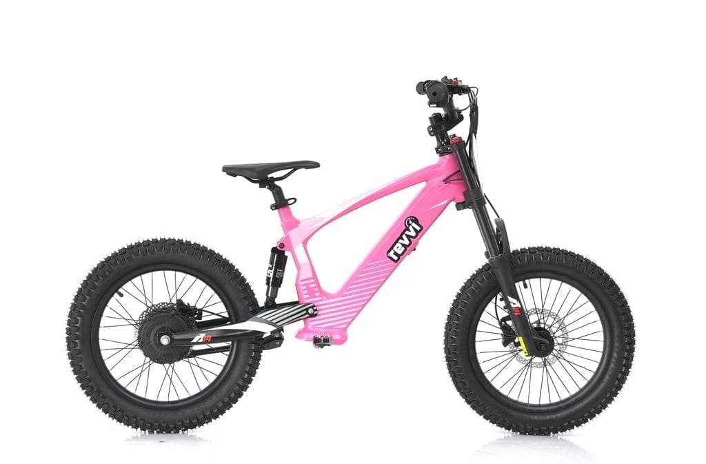 The Revvi 18" Kids Electric Balance Bike in pink is showcased against a white background. This adventurous model from Revvi boasts thick, knobby tires, a robust frame, and foldable MX-style foot pegs. It comes complete with black handlebars, pedals, and saddle for the perfect thrill-seeking ride!