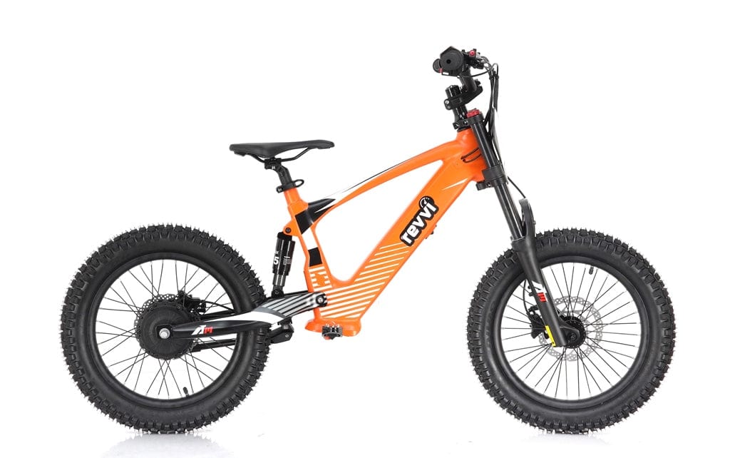 The Revvi 18" Kids Electric Balance Bike - Orange, crafted by Revvi, is an electric mountain bike designed with an eye-catching orange frame. It features thick tires and a black seat, enhanced by bold lines and the brand's name displayed prominently on the frame. Equipped with front and rear hydraulic disc brakes and a suspension system, it is ideally suited for navigating rough terrains.