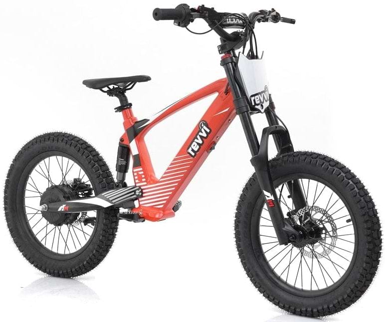 A Revvi 18" Kids Electric Balance Bike in red is showcased against a plain white backdrop, featuring rugged black tires, a suspension fork, and prominent "Revvi" branding on the frame, making it ideal for adventurous young riders.