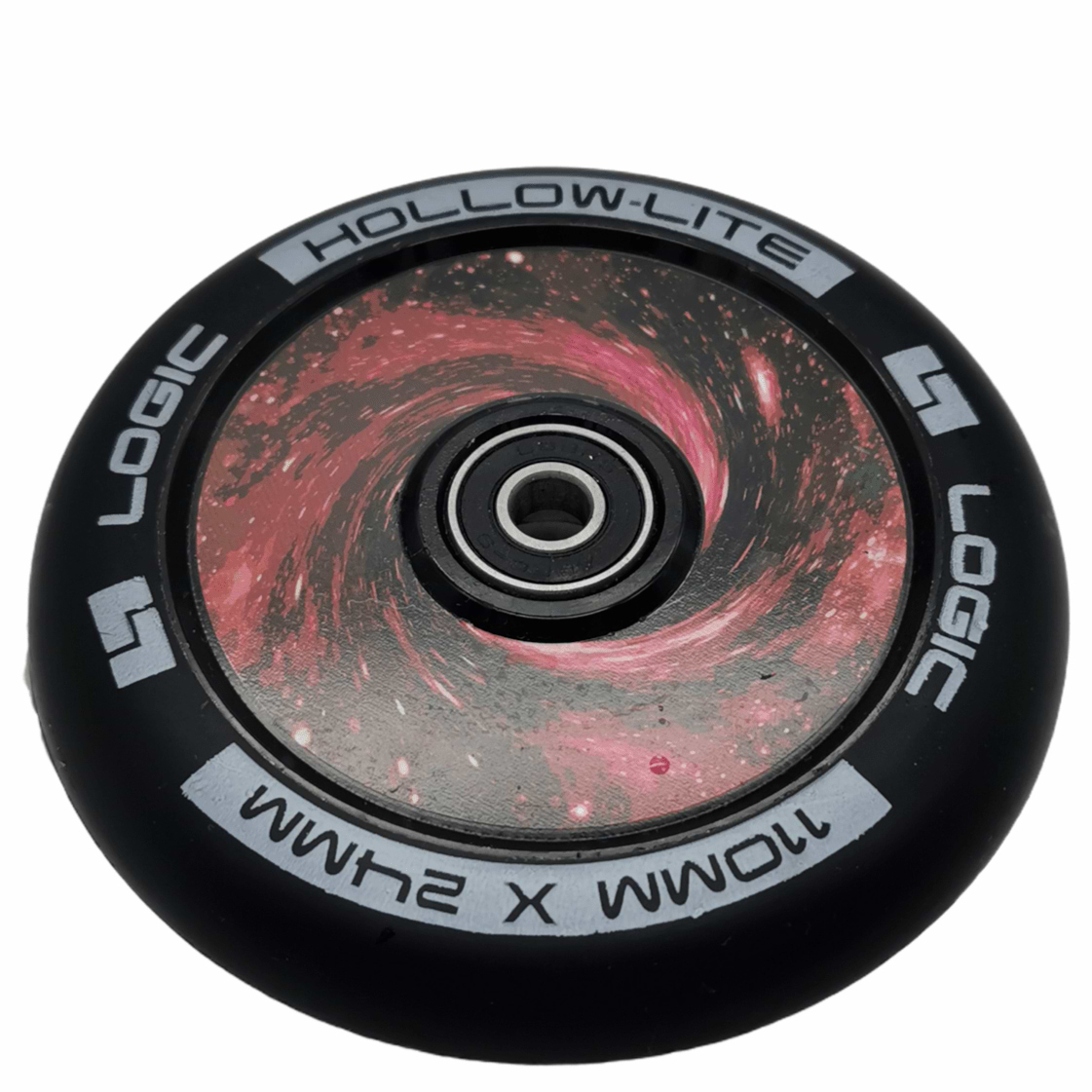 The Logic Hollow Lite 110mm Stunt Scooter Wheel - Vortex Red features a striking galaxy design in the center, showcasing swirling pink and red patterns. This black wheel is branded with "LOGIC" and incorporates the advanced Hollow Lite technology, marked as "HOLLOW-LITE" and measuring "110MM X 24MM." It also includes ABEC 11 bearings for an exceptionally smooth ride.