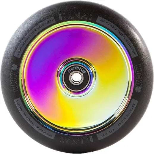 A close-up of the Lucky Lunar 120mm Stunt Scooter Wheel in Neochrome reveals a stunning iridescent center with "LUCKYSPEEDS LUNAR" etched into it, encircled by intricate floral patterns. Its sleek black edge highlights the advanced Lucky Rebound Technology for an exceptionally smooth ride.