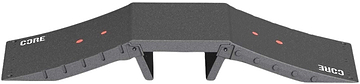 The CORE Mini Funbox Ramp Set - 2 Kickers & Flat Deck is a black plastic ramp by CORE, featuring two sloped sides, "CORE" in white on both ends, red dots, support legs under the platform, and a modular design.