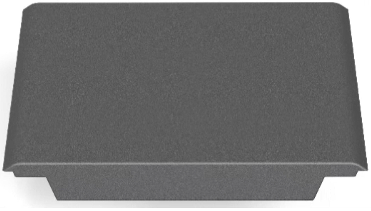 A gray, rectangular plastic cover with a smooth, slightly raised top and flared edges, resembling the CORE Mini Funbox Ramp Set – 2 Kickers & Flat Deck by CORE, viewed from an angle showing both the top and one side.